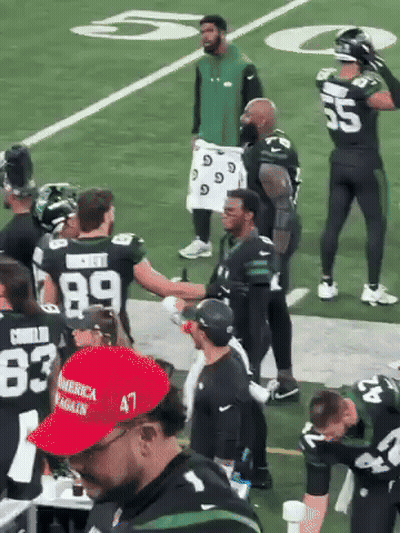 Man In Red America Again Hat Shakes Hands With Football Players GIF