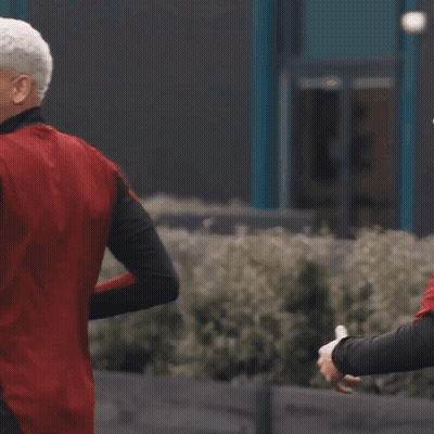 Man In Red And Black Adidas Jacket Running GIF