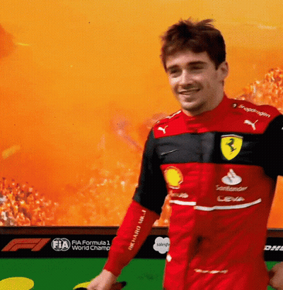Man In Red And Black Ferrari Jersey GIF