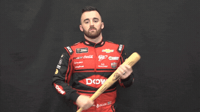 Man In Red And Black Racing Uniform Holding Baseball Bat GIF