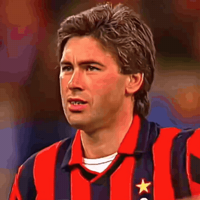 Man In Red And Black Striped Shirt With Star GIF