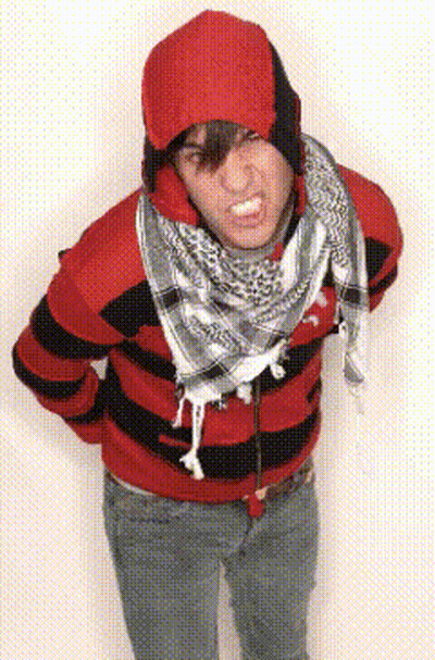 Man In Red And Black Striped Sweater And Scarf Making Funny Face GIF