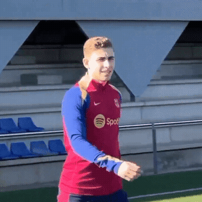 Man In Red And Blue Shirt With Spotify GIF