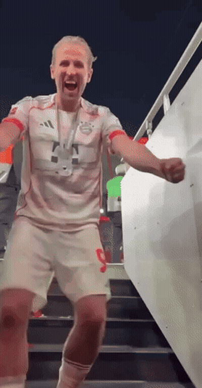 Man In Red And White Adidas Shirt On Stairs GIF