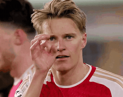 Man In Red And White Adidas Shirt Wiping Face GIF
