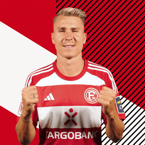 Man in Red and White Argobank Jersey