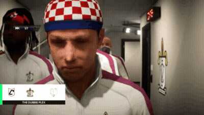 Man In Red And White Checkered Hat Hallway GIF