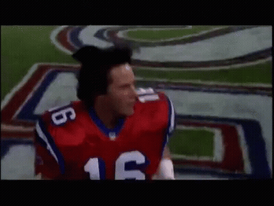Man In Red And White Football Jersey Number 16 GIF