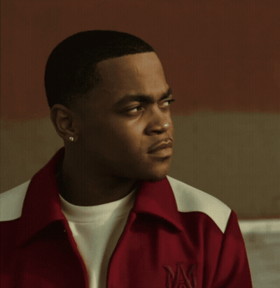 Man In Red And White Jacket With Letter M GIF
