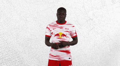 Man In Red And White Jersey With Bull GIF