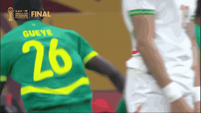 Man In Red And White Jersey With Bull GIF
