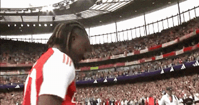 Man In Red And White Jersey With Number 11 GIF