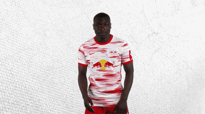 Man In Red And White Jersey With Red Bull GIF