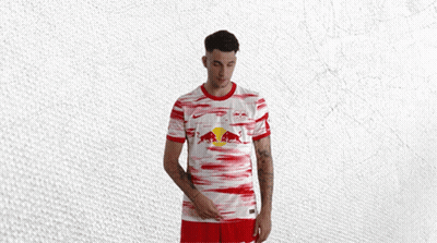 Man In Red And White Jersey With Red Bull GIF