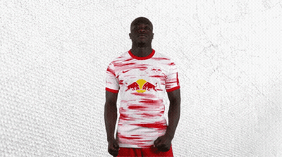 Man In Red And White Jersey With Red Bull GIF