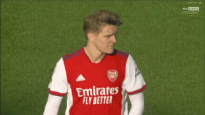 Man In Red And White Jersey With Rwan On Sleeves GIF