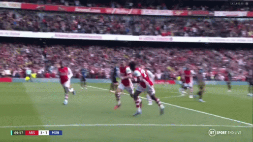 Man In Red And White Jersey With Visit Rwanda GIF