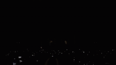Man In Red And White LNB Jersey In Crowd GIF