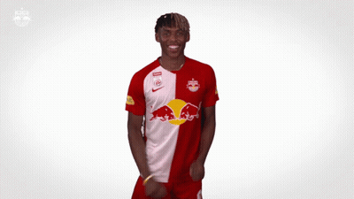 Man In Red And White Red Bull Jersey GIF