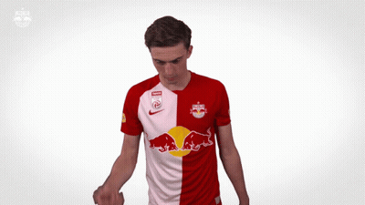 Man In Red And White Red Bull Jersey GIF