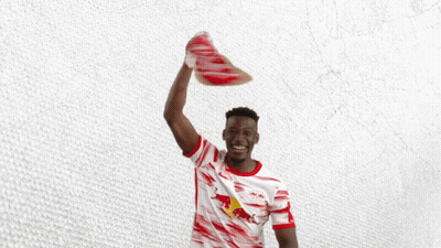 Man In Red And White Shirt Holding Scarf With Letter R GIF