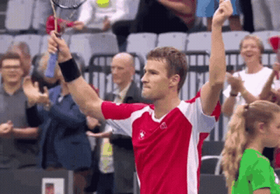 Man In Red And White Shirt Holding Tennis Racquet GIF