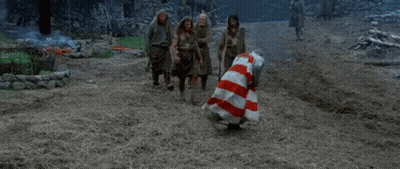 Man In Red And White Striped Dress Dancing With Others GIF