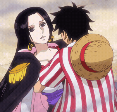 Man In Red And White Striped Shirt Holding Woman GIF