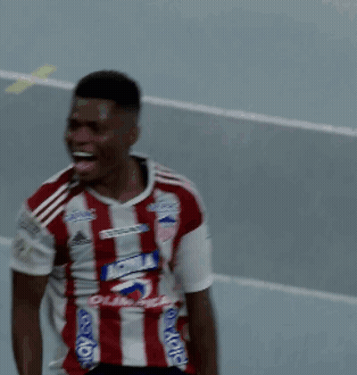 Man In Red And White Striped Shirt Saying Aguila GIF