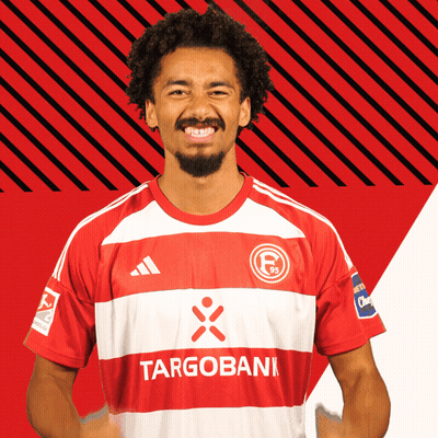 Man In Red And White Striped Shirt Targobank GIF