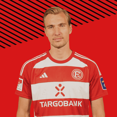 Man in Red and White Striped Shirt Targobank