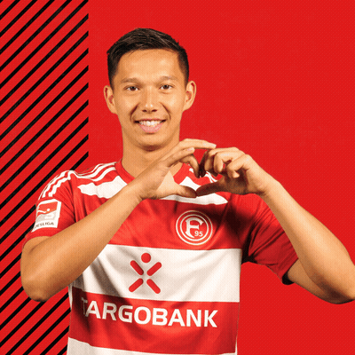 Man In Red And White Striped Shirt With Argobank GIF