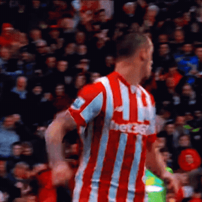 Man in Red and White Striped Shirt With Bet365