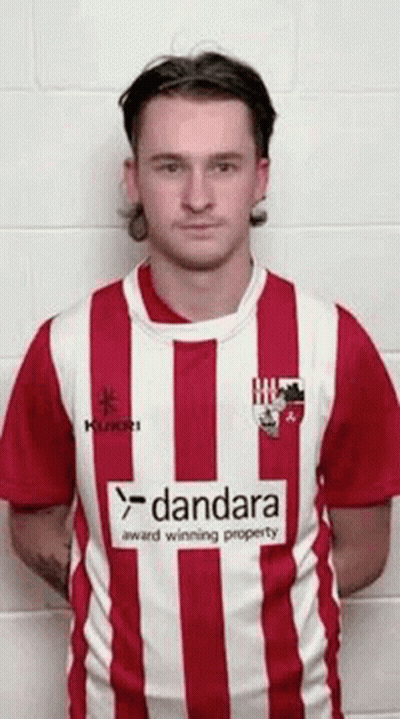 Man In Red And White Striped Shirt With Dandara Logo GIF