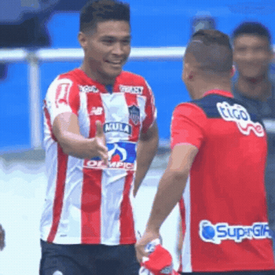 Man In Red And White Striped Shirt With Guila GIF