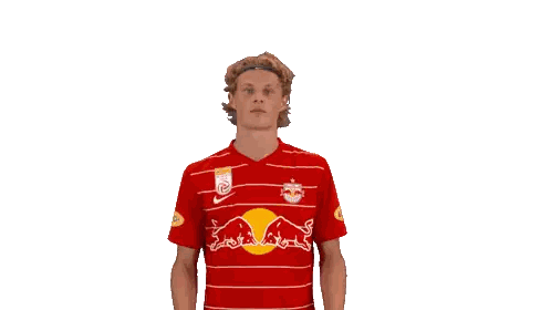 Man In Red And White Striped Shirt With Red Bull Sticker