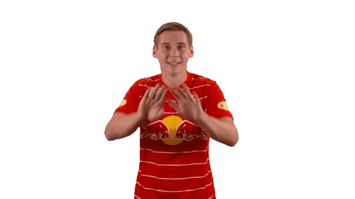 Man In Red And White Striped Shirt With Red Bull Sticker
