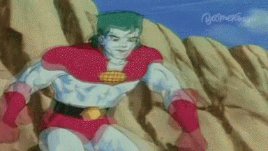 Man In Red And White Superhero Costume On Rock GIF