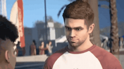 Man In Red And White T-Shirt Talking To Another Man GIF
