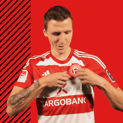 Man In Red And White Targobank Shirt GIF