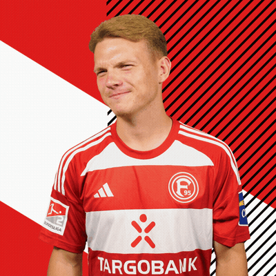 Man in Red and White Targobank Soccer Jersey