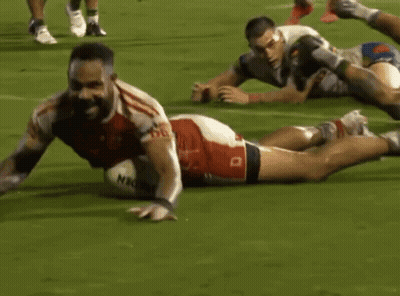 Man In Red And White TMCS Jersey Kicking Soccer Ball GIF