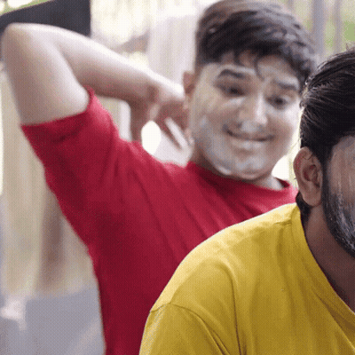 Man In Red And Yellow Shirt Smiling GIF