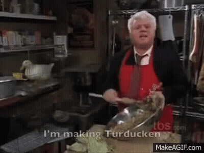Man In Red Apron Says I'm Making Turducken GIF