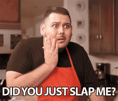 Man In Red Apron Surprised Did You Just Slap Me GIF