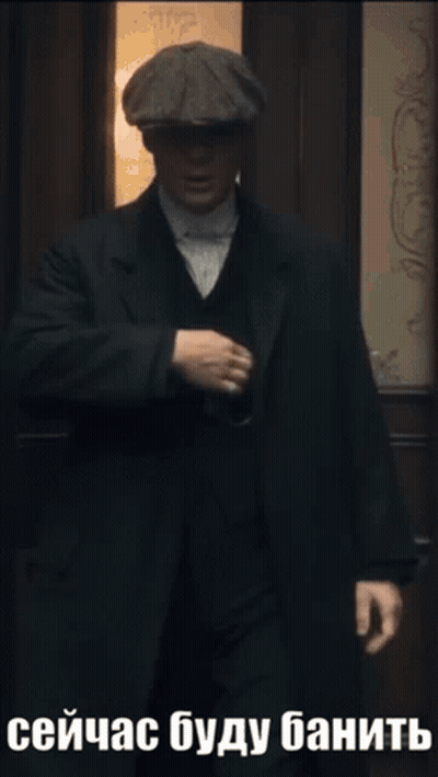 Man In Red Baseball Cap And White Sweater Smiling GIF