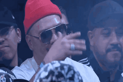 Man In Red Beanie And Sunglasses With Ring GIF