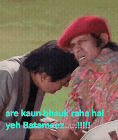 Man in Red Beret Talking to Another Man