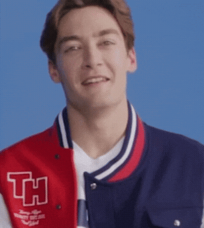 Man In Red-Blue Varsity Jacket With H GIF