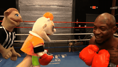 Man In Red Boxing Gloves In Ring GIF
